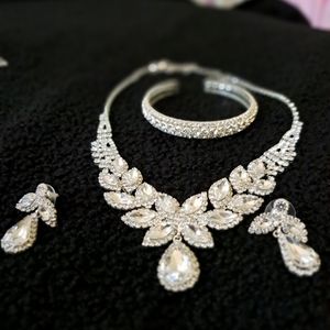 Earrings bracelet and necklace used only once last month